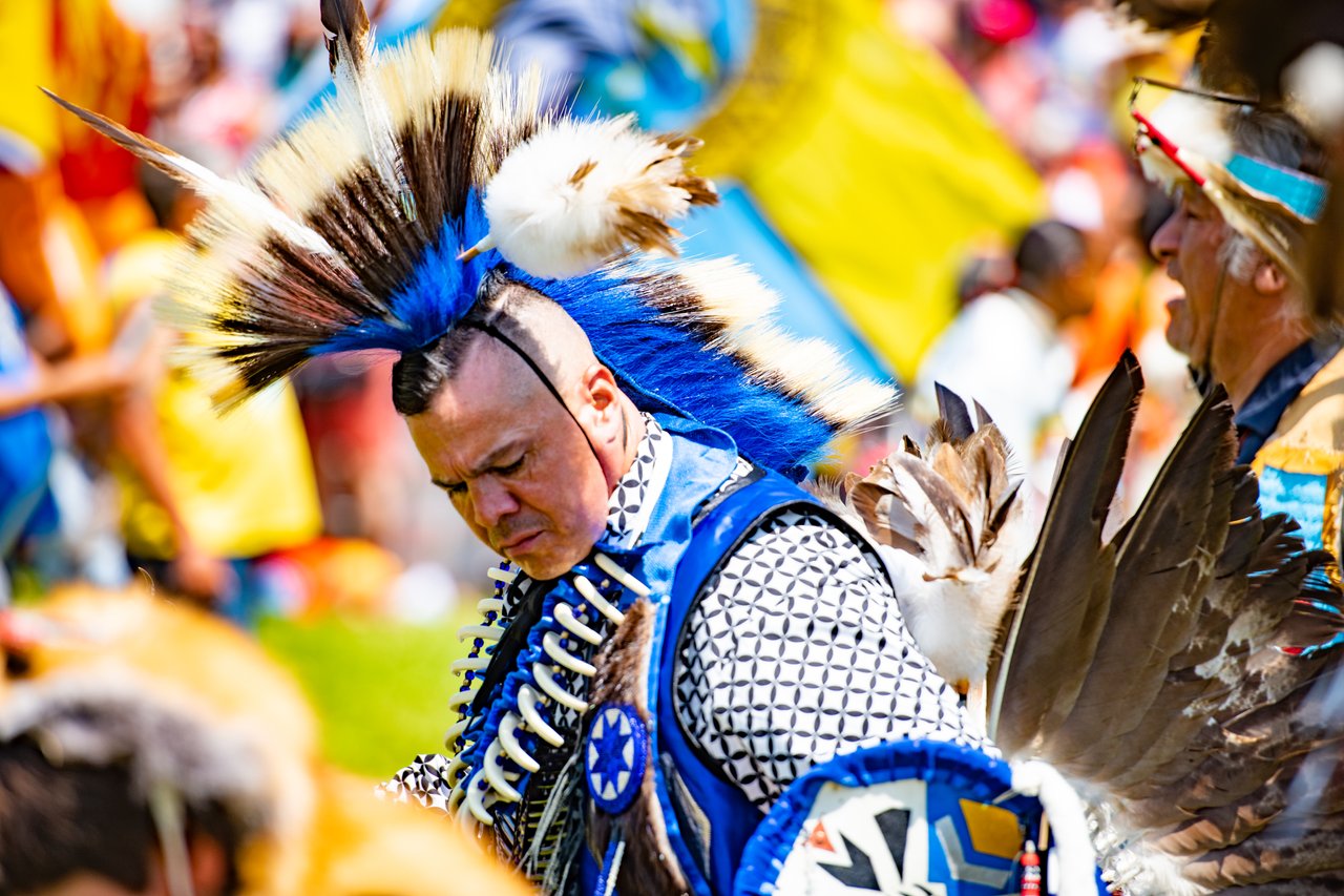 Man in colourful regalia at Sitansisk Annual Powow.